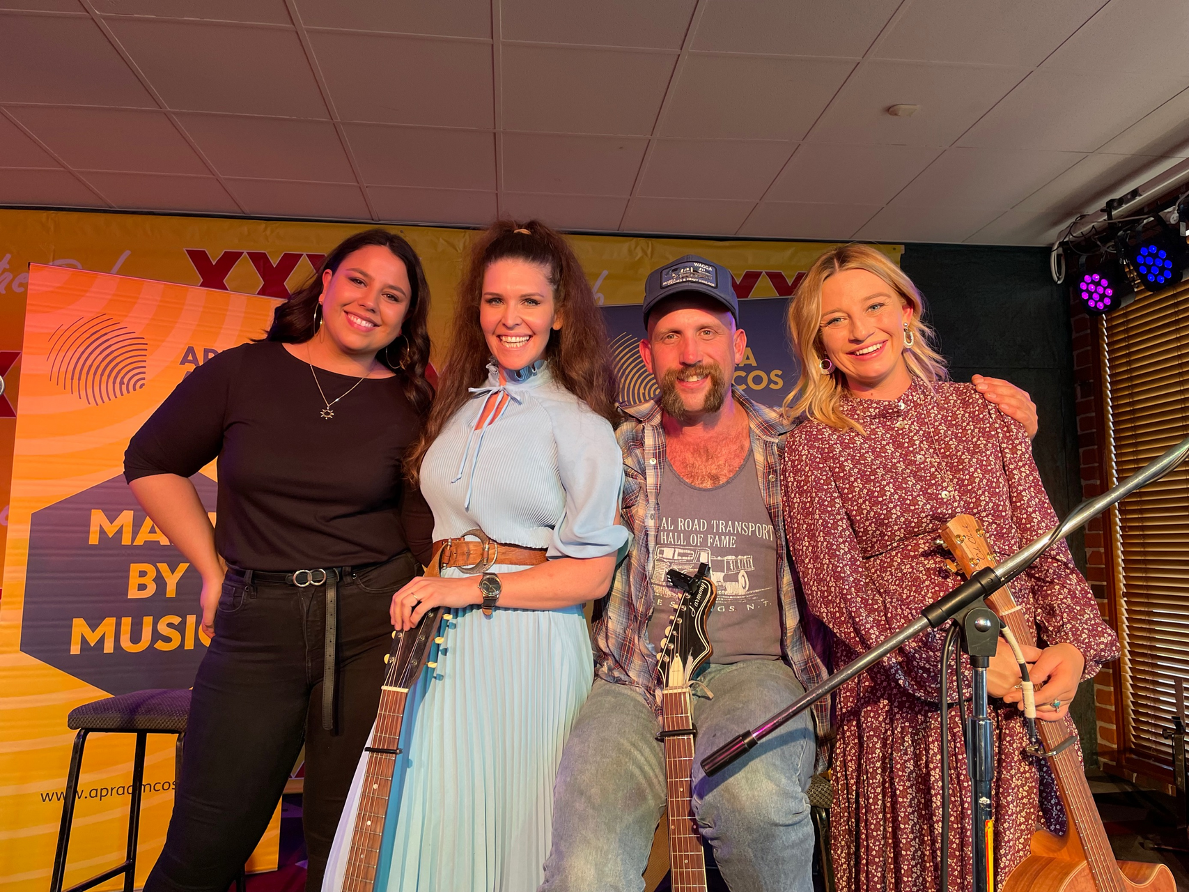Song Craft Tamworth: Loren Ryan, Fanny Lumsden, Andy Golledge, Ashleigh Dallas standing in a row on a stage