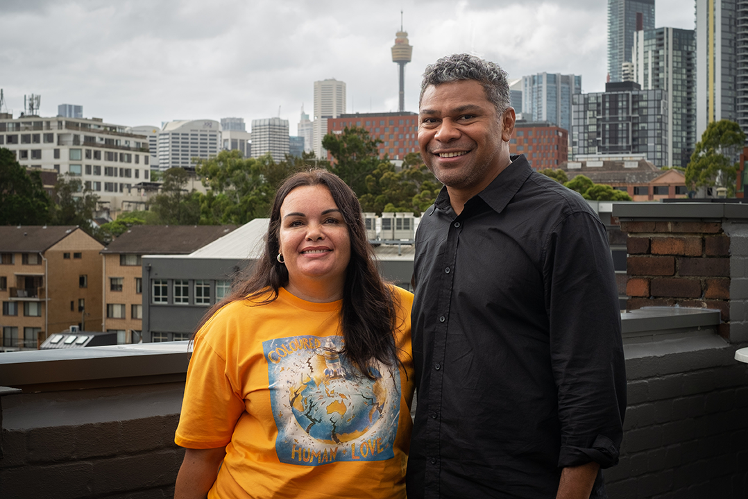 Catherine Satour and Fred Leone at APRA AMCOS with backdrop of Sydney skyline (photo by Georgia Ginnivan)