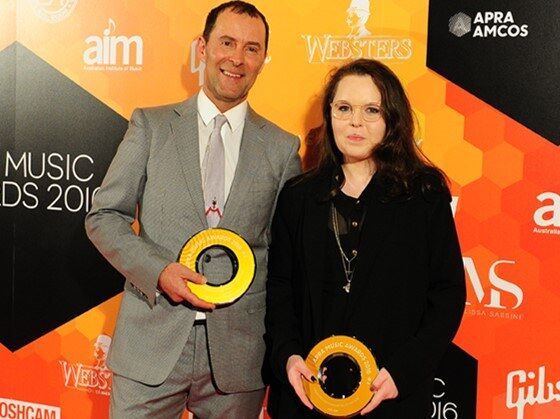 Publisher Damian Trotter and songwriter Alex Hope pose with trophies at the 2016 APRA Music Awards