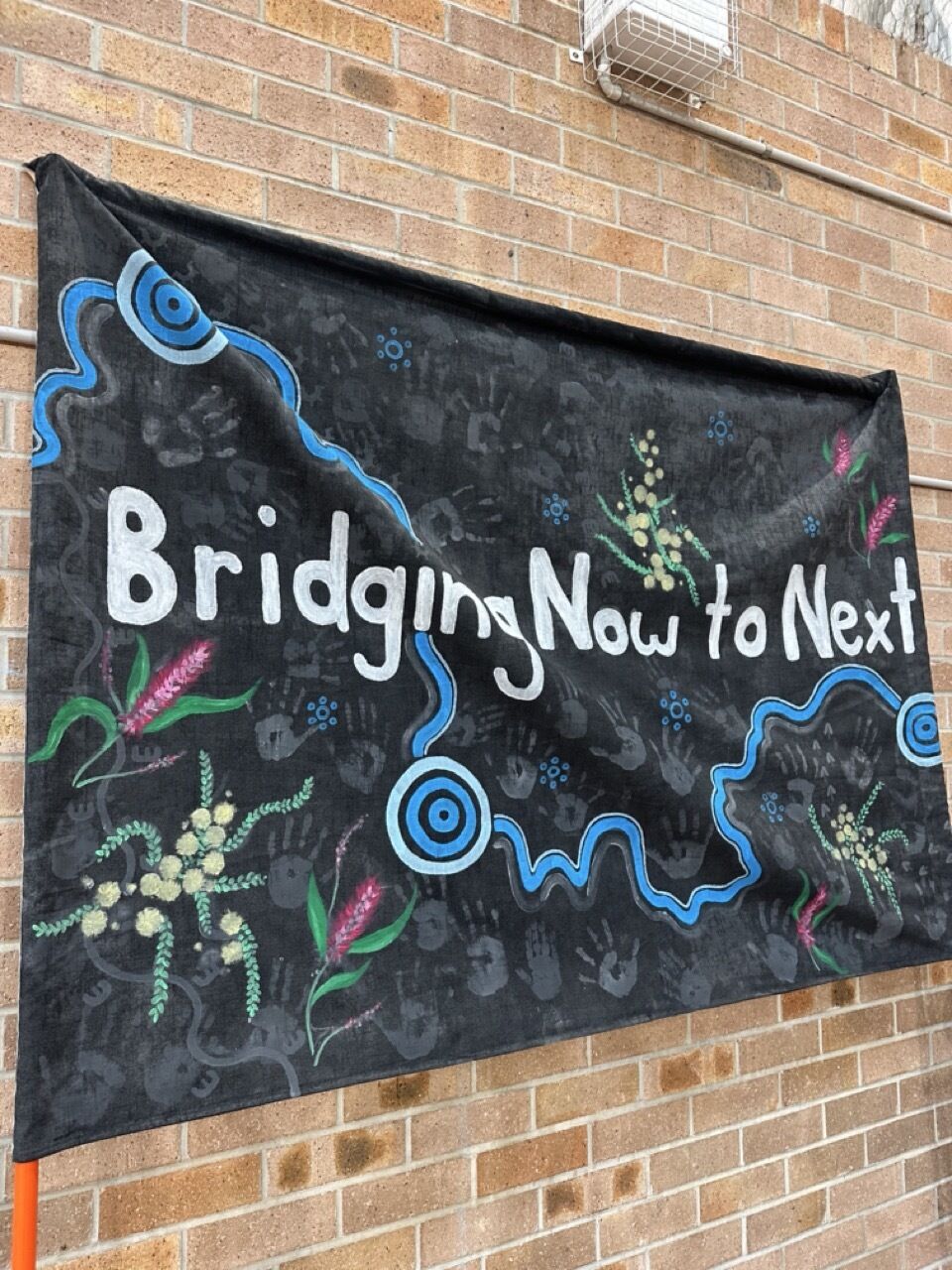 Bridging Now to Next flag. Photo: Gillian Dunn